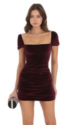 Picture Square Neck Velvet Ruched Bodycon Dress in Maroon. Source: https://media-img.lucyinthesky.com/data/Nov23/150xAUTO/14f4fffa-e1d4-43e6-b8ab-4671dff5e3cc.jpg