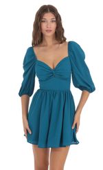 Picture Shimmer Chiffon Twist Dress in Teal. Source: https://media-img.lucyinthesky.com/data/Nov23/150xAUTO/2f0be209-228c-48ce-a9f6-d7bfbb578f84.jpg