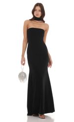 Picture Velvet Reverse Halter Dress in Black. Source: https://media-img.lucyinthesky.com/data/Nov23/150xAUTO/9bdcab03-5f85-43bf-a55b-792223b3e1a8.jpg