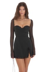Picture Ruffle Long Sleeve Dress in Black. Source: https://media-img.lucyinthesky.com/data/Nov23/150xAUTO/dfa69377-aa4c-4623-ae6a-525520799040.jpg