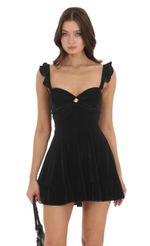 Picture Velvet Ruffle Strap A-Line Dress in Black. Source: https://media-img.lucyinthesky.com/data/Nov23/150xAUTO/e19f16e9-e0c2-4ae6-95a2-f05ea3e09faa.jpg