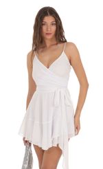 Picture Wrap Dress in White Shimmer. Source: https://media-img.lucyinthesky.com/data/Nov23/150xAUTO/fd6aafda-bc43-4b7c-b6b8-9ea5bf48f175.jpg
