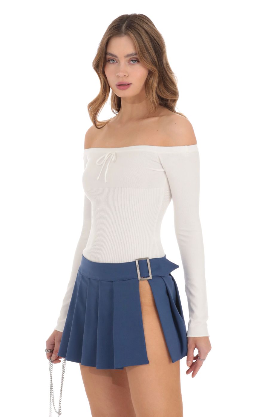 Picture Ribbed Off Shoulder Top in White. Source: https://media-img.lucyinthesky.com/data/Nov23/850xAUTO/09c6606c-9eff-4ba5-8abe-ca55f05ed12f.jpg