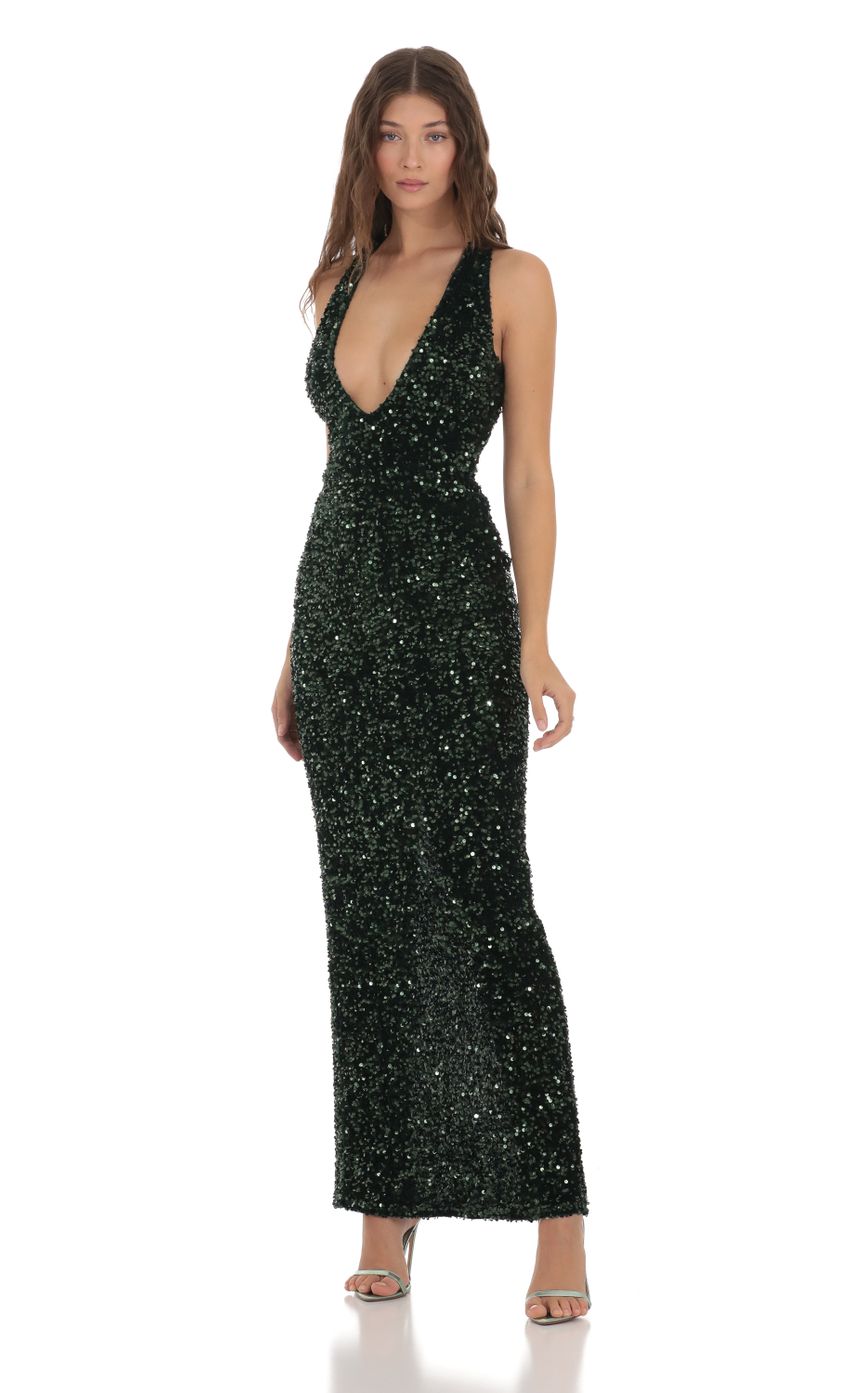 Picture Velvet Sequin Plunge Neck Dress in Green. Source: https://media-img.lucyinthesky.com/data/Nov23/850xAUTO/1835ebbb-efcc-4ce0-ad6f-835fefc5a80a.jpg