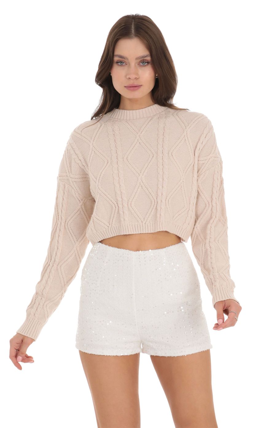 Picture Sequin High Waisted Shorts in White. Source: https://media-img.lucyinthesky.com/data/Nov23/850xAUTO/18925c5f-c278-45d7-9887-ccf9361e3d64.jpg