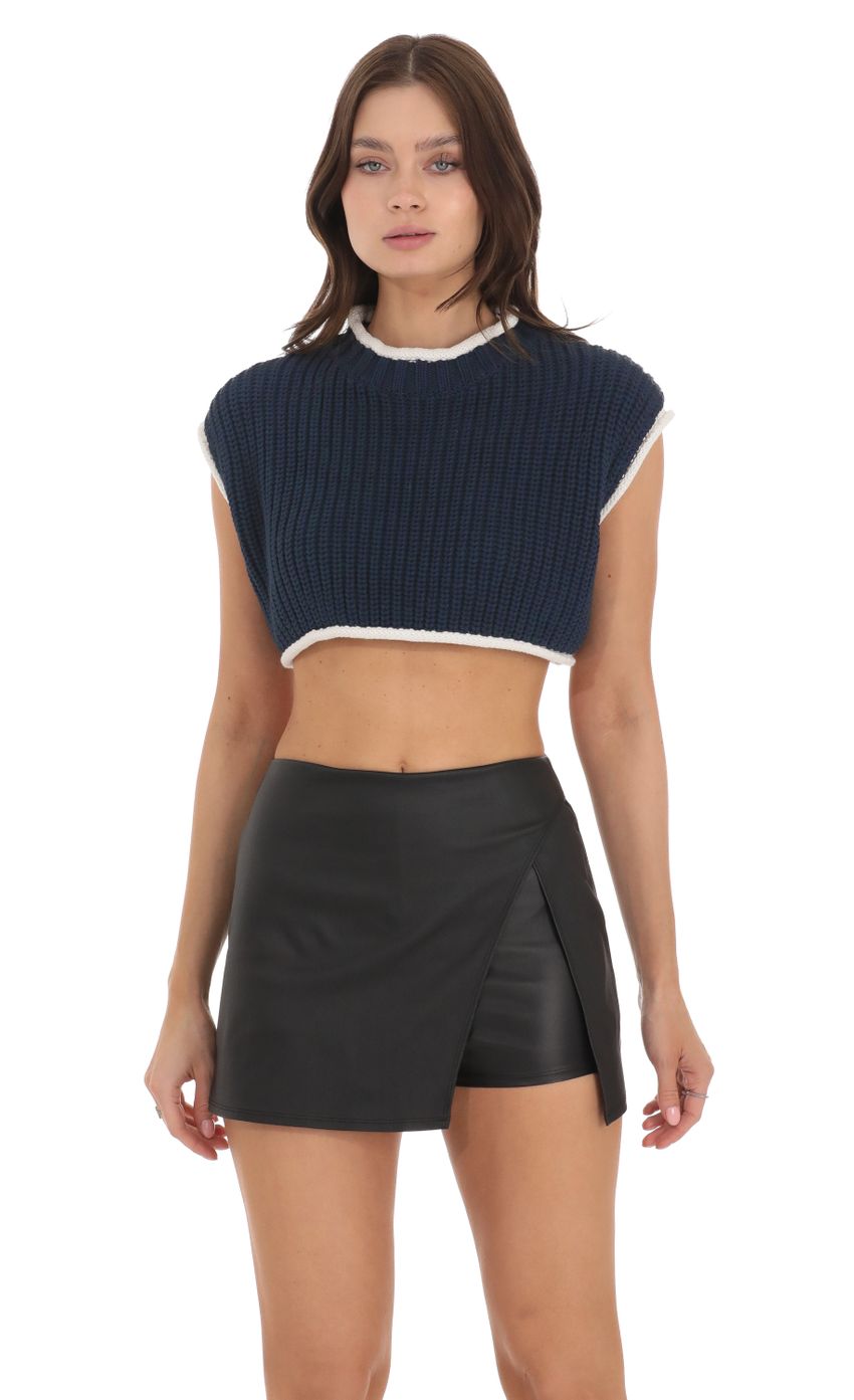 Picture Knit Open Back Cropped Top in Navy. Source: https://media-img.lucyinthesky.com/data/Nov23/850xAUTO/1f3e26d8-df8e-4738-990d-ec9793c9ebdf.jpg