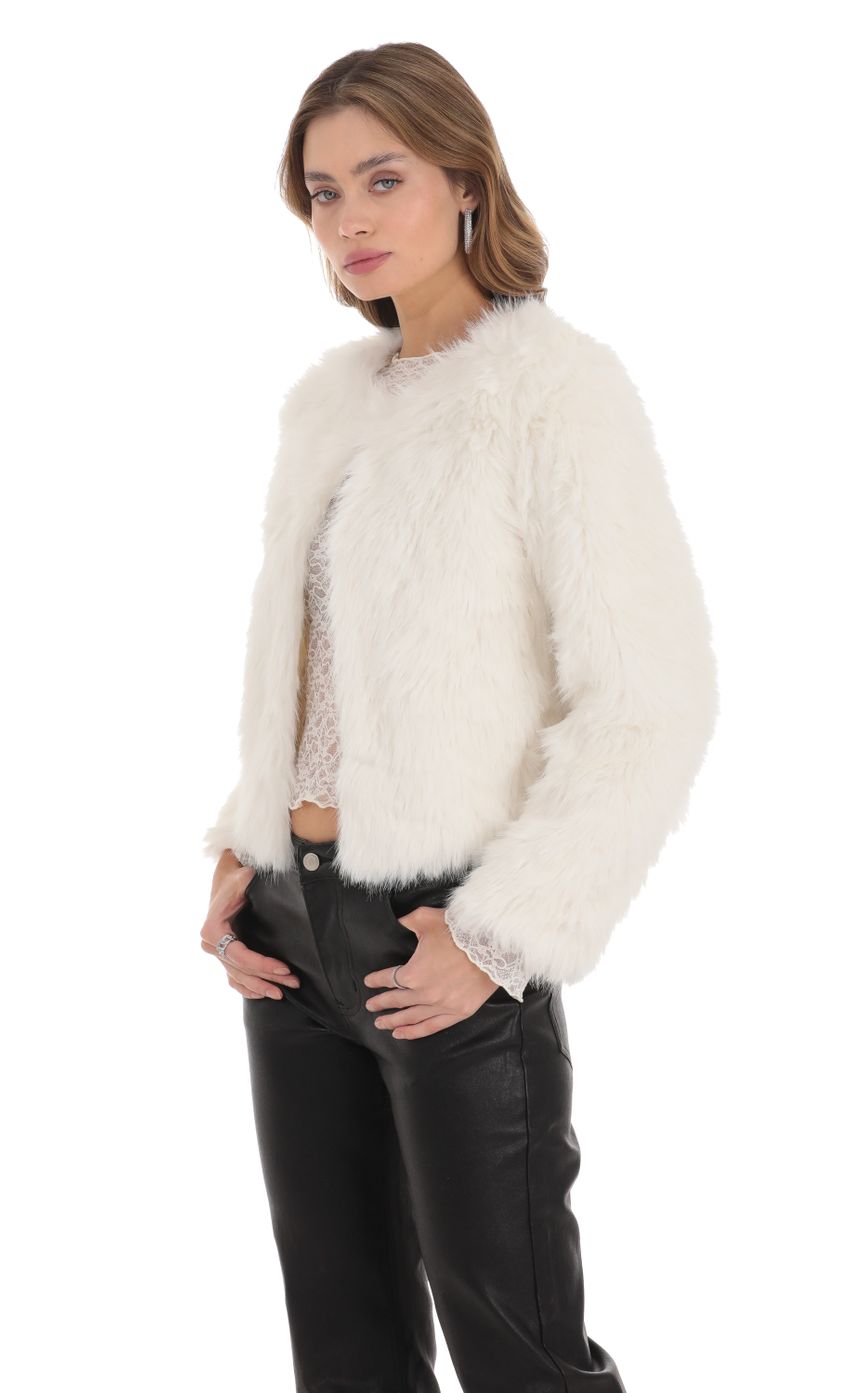 Picture Faux Fur Jacket in White. Source: https://media-img.lucyinthesky.com/data/Nov23/850xAUTO/29e14058-f82a-4acd-a03a-5c27dea99867.jpg