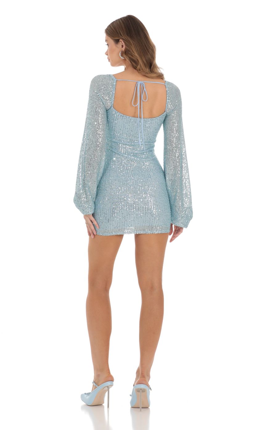 Picture Shantelle Sequin Long Sleeve Dress in Blue. Source: https://media-img.lucyinthesky.com/data/Nov23/850xAUTO/2b66dfda-a72a-4a74-bc59-ab2867c331f3.jpg