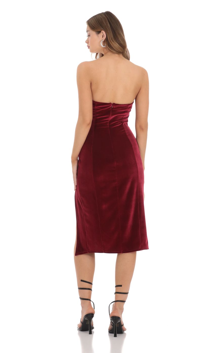Picture Ruffle Velvet Strapless Midi Dress in Maroon. Source: https://media-img.lucyinthesky.com/data/Nov23/850xAUTO/2bfb6300-d14b-4680-8966-8d6d71bce45a.jpg