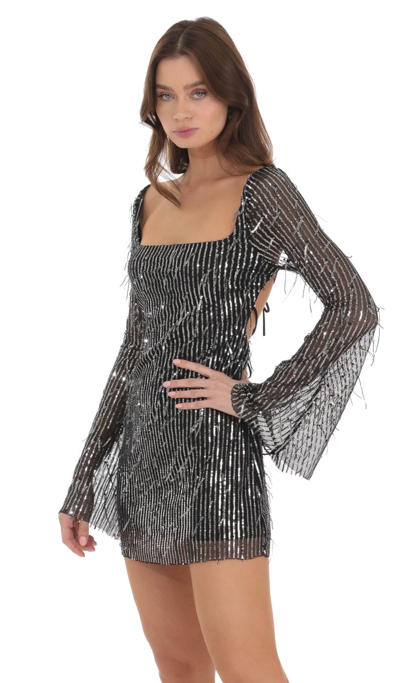 Picture Fringe Silver Sequin Dress in Black. Source: https://media-img.lucyinthesky.com/data/Nov23/850xAUTO/34514af0-8594-410f-b683-ea03278cefe1.jpg