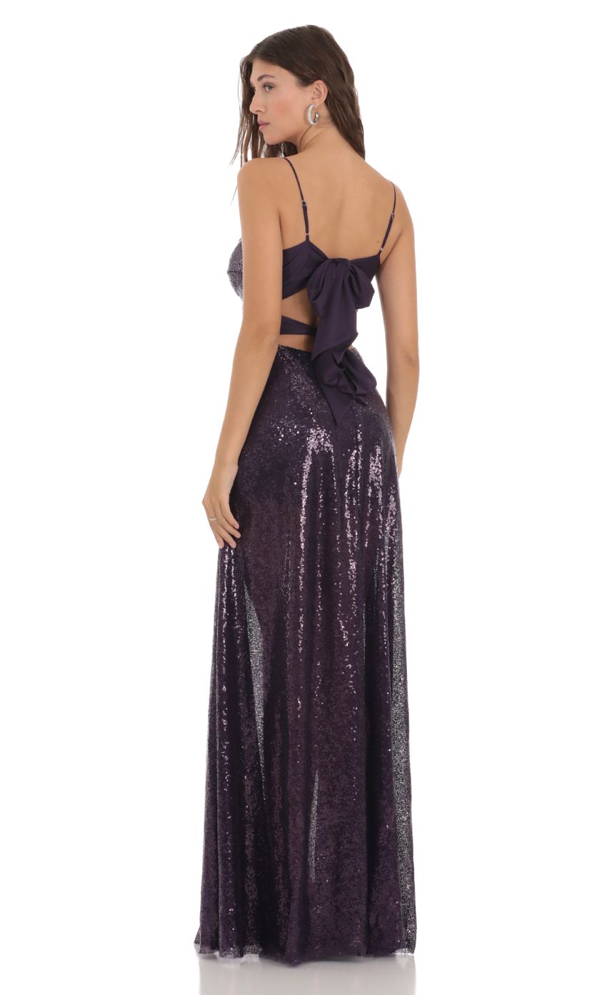 Picture Twist Sequin Back Tie Dress in Purple. Source: https://media-img.lucyinthesky.com/data/Nov23/850xAUTO/3704f8fb-a525-4f0d-bc5b-a1c47c223a93.jpg