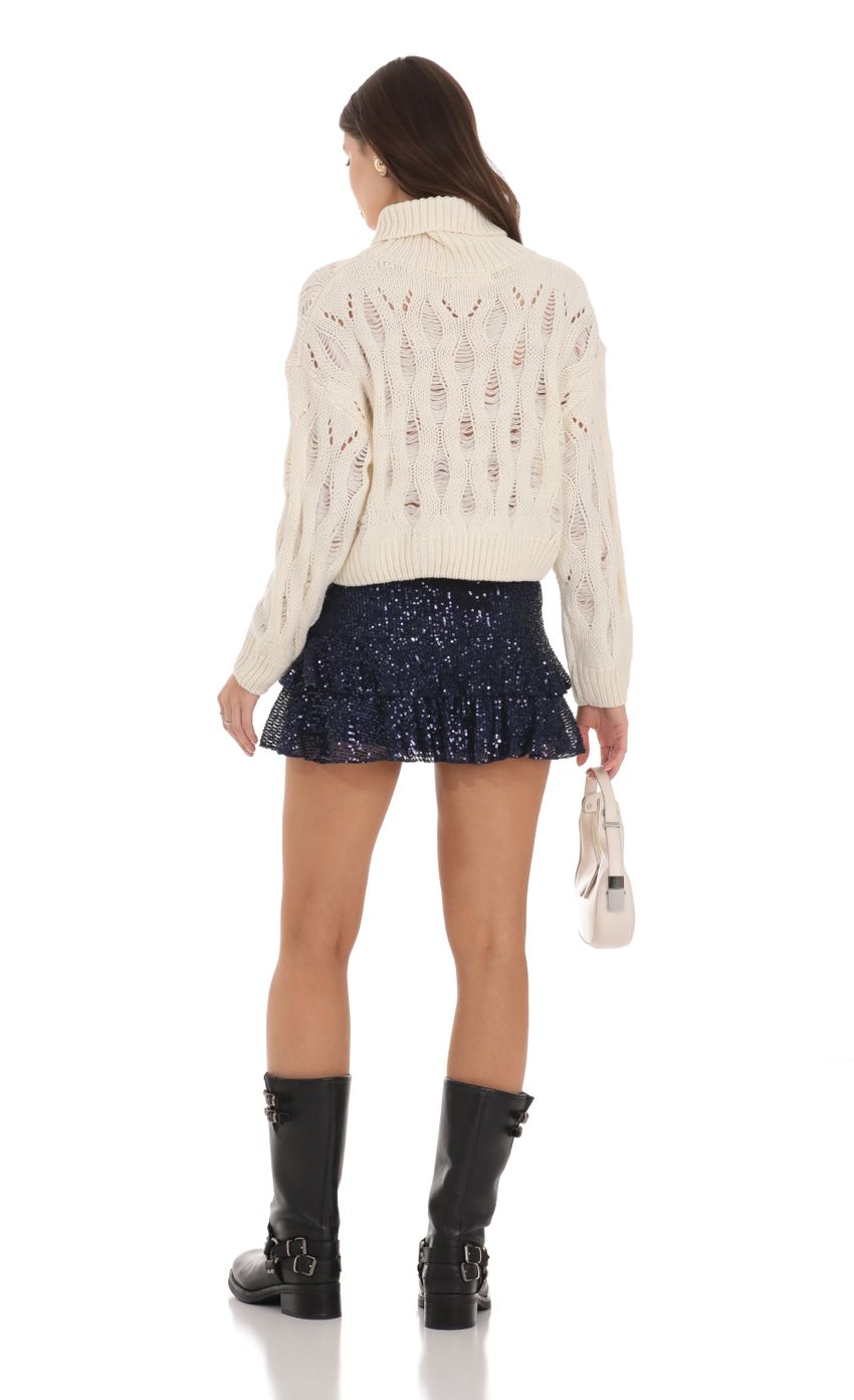 Picture Sequin Low Rise Ruffle Skirt in Navy. Source: https://media-img.lucyinthesky.com/data/Nov23/850xAUTO/45ff9d4f-5e6a-4392-8ede-fdb1dfa483b9.jpg