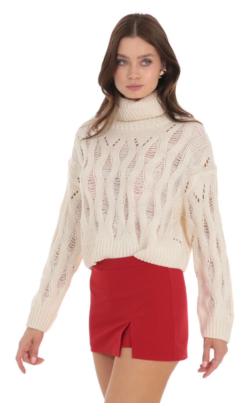 Picture Knit Turtleneck Jumper in Ivory. Source: https://media-img.lucyinthesky.com/data/Nov23/850xAUTO/4ca16e95-1316-482a-971e-d14373687aba.jpg