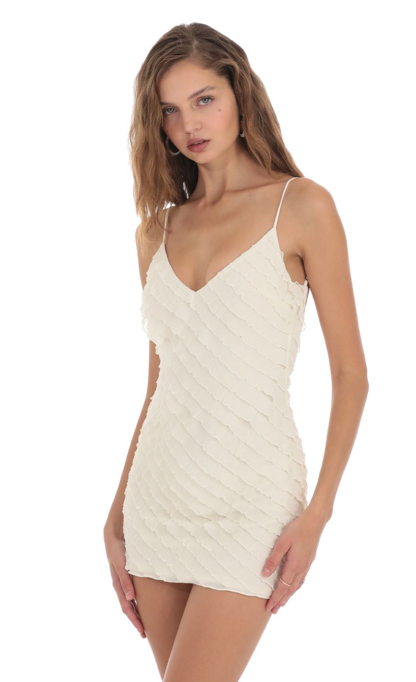 Picture Ruffle Open Back Dress in Ivory. Source: https://media-img.lucyinthesky.com/data/Nov23/850xAUTO/52ce80e0-7c12-4714-b2d1-ca449fbea375.jpg