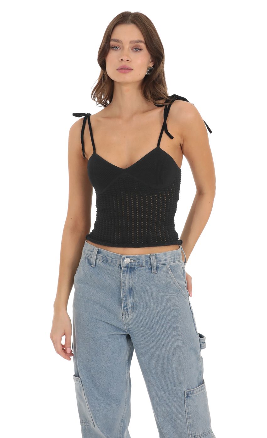 Picture Open Knit Top in Black. Source: https://media-img.lucyinthesky.com/data/Nov23/850xAUTO/64380dca-4dea-4b33-87b8-be57aaa3c96b.jpg