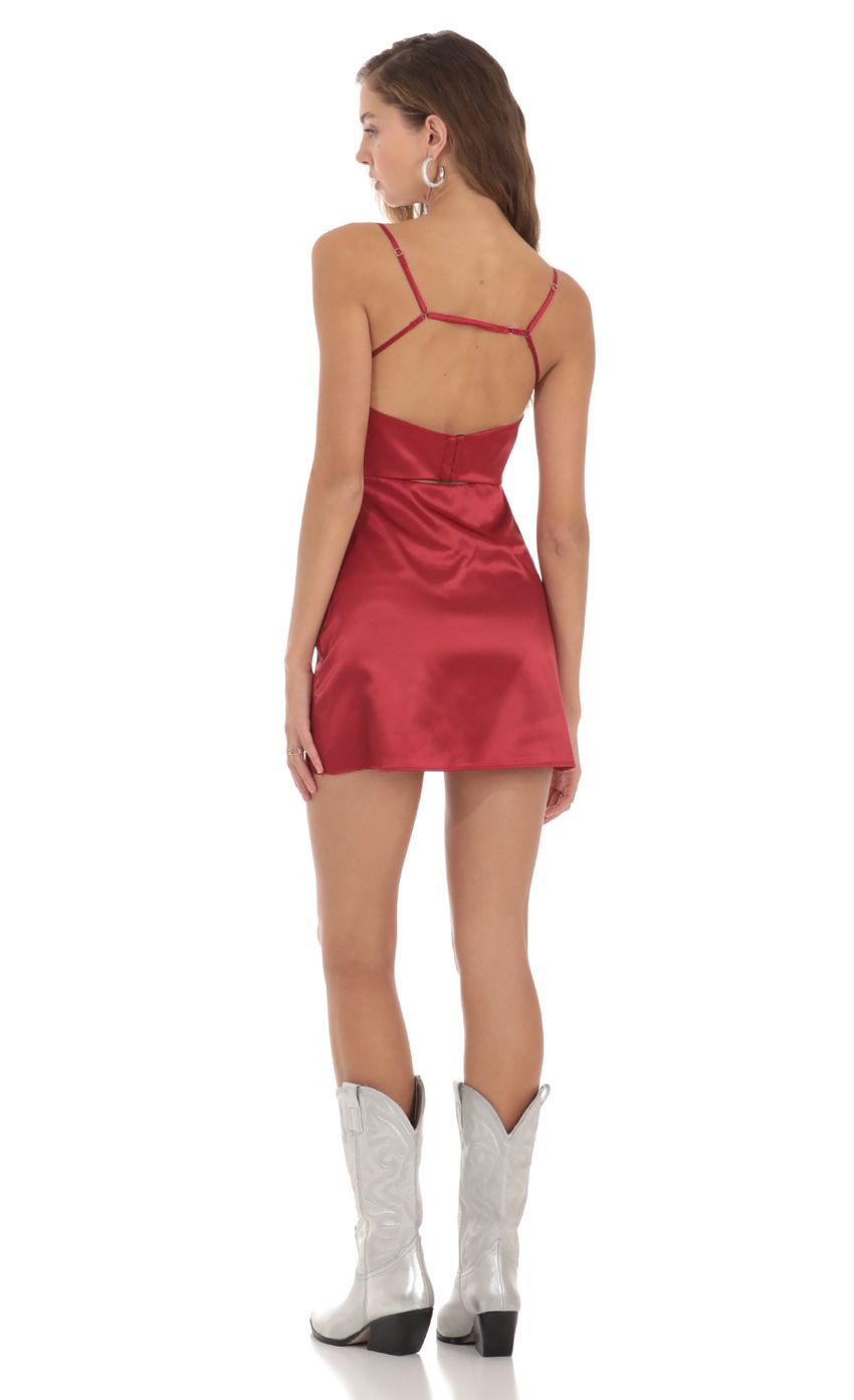 Picture Satin Strappy Back Dress in Red. Source: https://media-img.lucyinthesky.com/data/Nov23/850xAUTO/9e69c154-a72a-44a7-81a2-a8fd6280e108.jpg