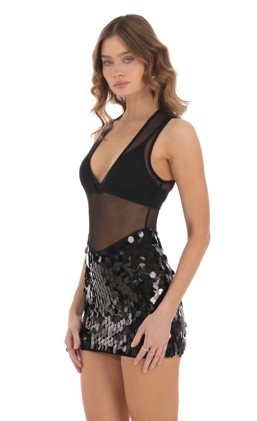 Picture Mesh Sequin Skirt Dress in Black. Source: https://media-img.lucyinthesky.com/data/Nov23/850xAUTO/a0c7e226-fcfd-4117-9230-f57a2b98cb5d.jpg