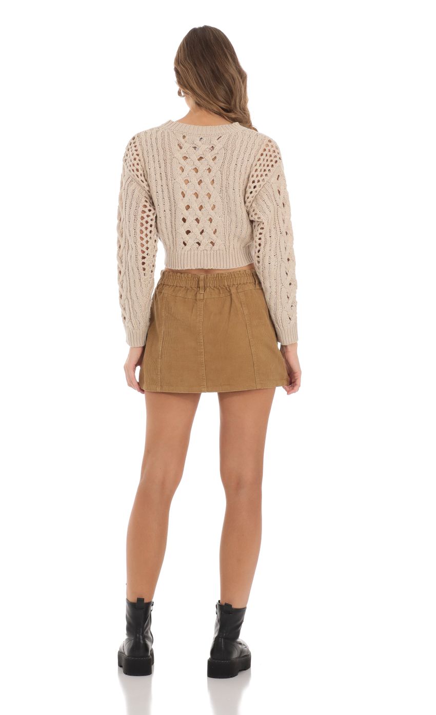 Picture Open Knit Cropped Jumper in Beige. Source: https://media-img.lucyinthesky.com/data/Nov23/850xAUTO/a15b4cb6-f38c-4f8f-81c7-04f1d4569ff3.jpg