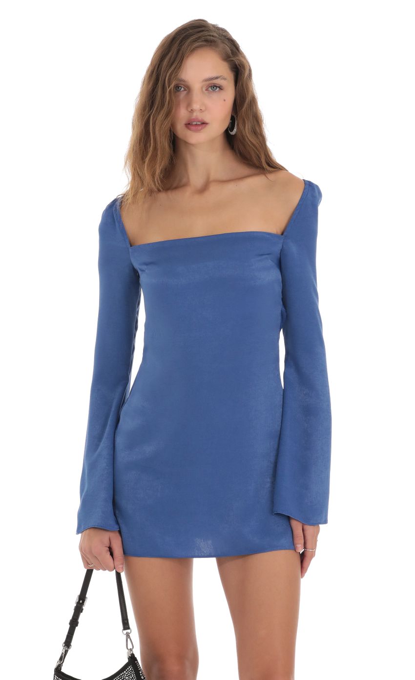 Picture Satin Long Sleeve Open Back Dress in Blue. Source: https://media-img.lucyinthesky.com/data/Nov23/850xAUTO/a6c048fc-fb09-45a3-8e2c-a5ca918fd0fe.jpg