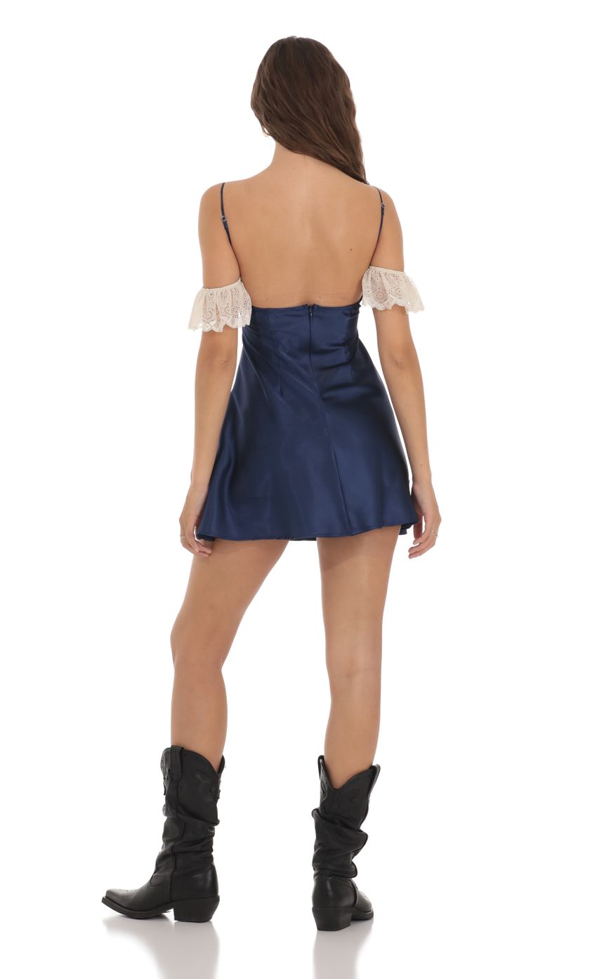 Picture Off Shoulder Lace Satin Dress in Navy. Source: https://media-img.lucyinthesky.com/data/Nov23/850xAUTO/aba6e179-5855-48c1-9f54-325280d58e0a.jpg