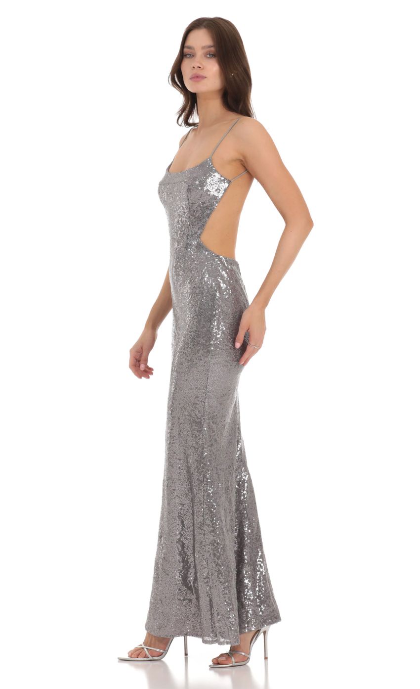Picture Sequin Open Back Dress in Silver. Source: https://media-img.lucyinthesky.com/data/Nov23/850xAUTO/b8f9c617-aad9-446e-9434-ca1a45ec4797.jpg