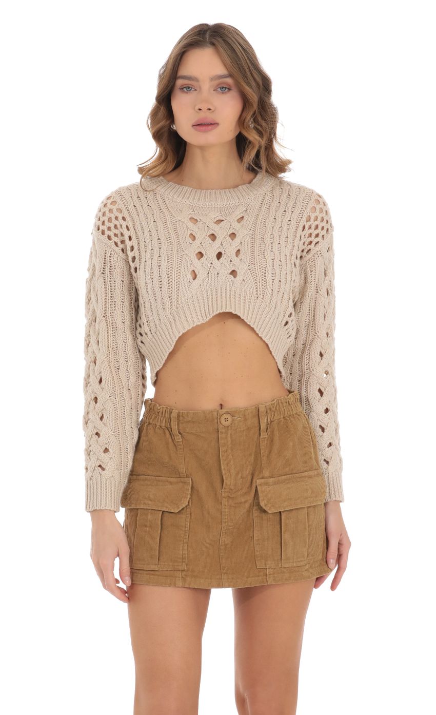 Picture Open Knit Cropped Jumper in Beige. Source: https://media-img.lucyinthesky.com/data/Nov23/850xAUTO/c1acb68e-bdf0-46df-801c-22be67ad8f73.jpg
