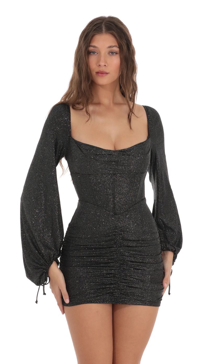 Picture Glitter Long Sleeve Corset Dress in Black. Source: https://media-img.lucyinthesky.com/data/Nov23/850xAUTO/c7aaa280-d115-4945-980e-261913dedd85.jpg