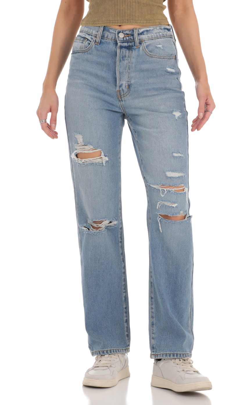 Picture Distressed Jeans in Light Denim. Source: https://media-img.lucyinthesky.com/data/Nov23/850xAUTO/ca7fceb5-e63d-4108-a022-0c1278f2fa97.jpg