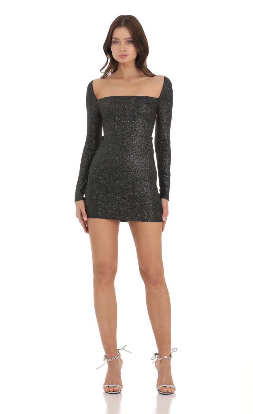 Picture Shimmer Long Sleeve Open Back Bodycon Dress in Black. Source: https://media-img.lucyinthesky.com/data/Nov23/850xAUTO/cf57ae53-c01c-482d-9427-a90e85e5196b.jpg