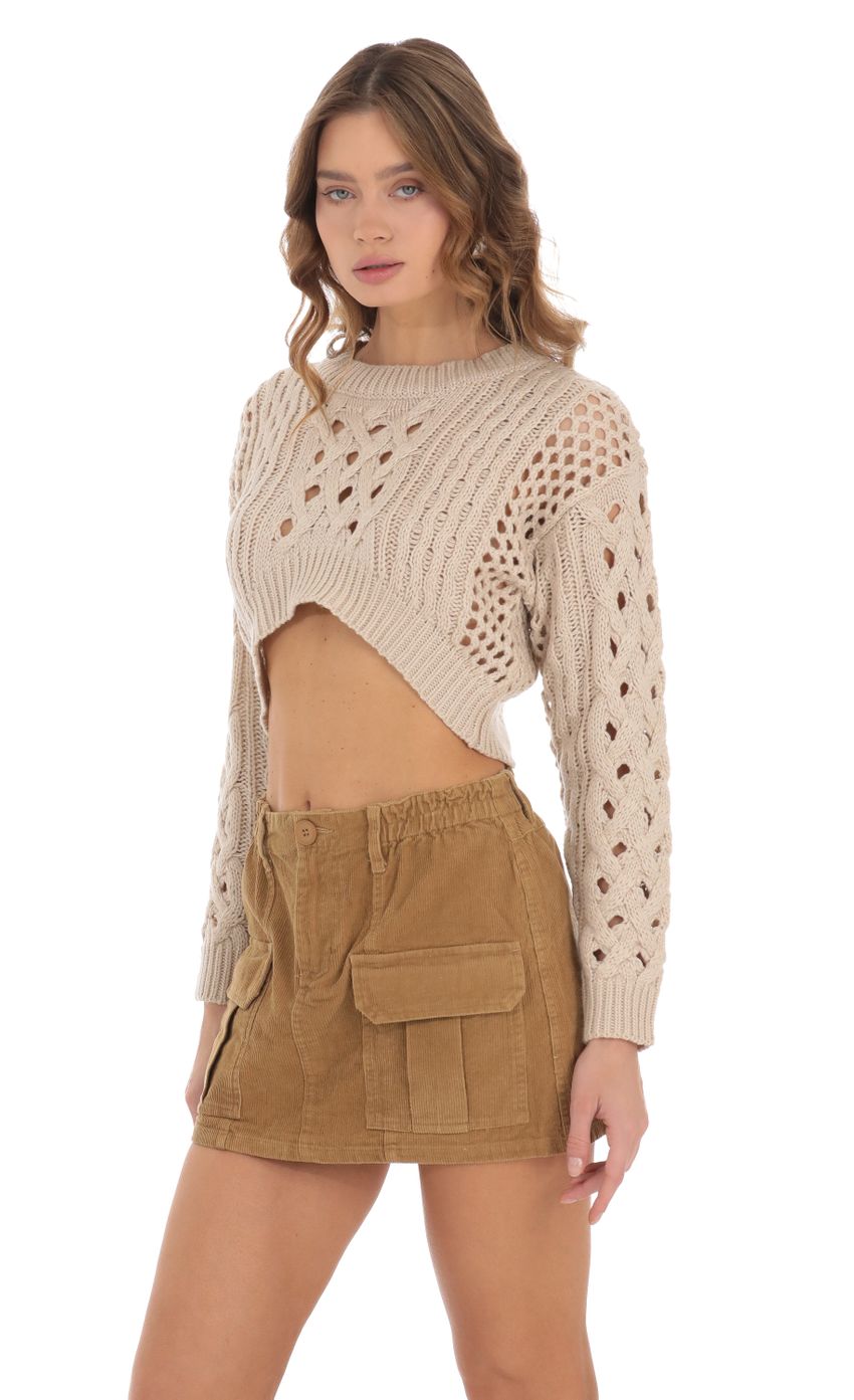 Picture Open Knit Cropped Jumper in Beige. Source: https://media-img.lucyinthesky.com/data/Nov23/850xAUTO/dabb5ce1-21c4-4377-9910-e72476aaac7a.jpg