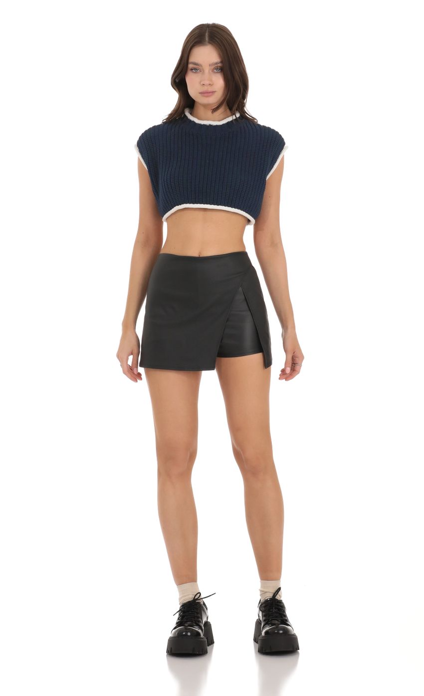 Picture Knit Open Back Cropped Top in Navy. Source: https://media-img.lucyinthesky.com/data/Nov23/850xAUTO/de05227a-9385-44f3-b623-70aeb40c5c17.jpg