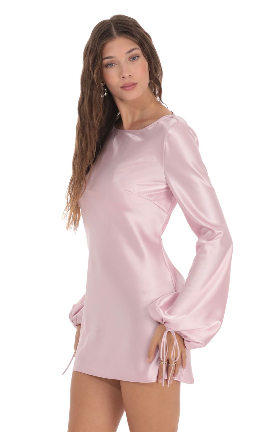 Picture Satin Long Sleeve Open Back Dress in Pink. Source: https://media-img.lucyinthesky.com/data/Nov23/850xAUTO/edb32c97-853b-43f8-b2d4-348a4797c8bb.jpg