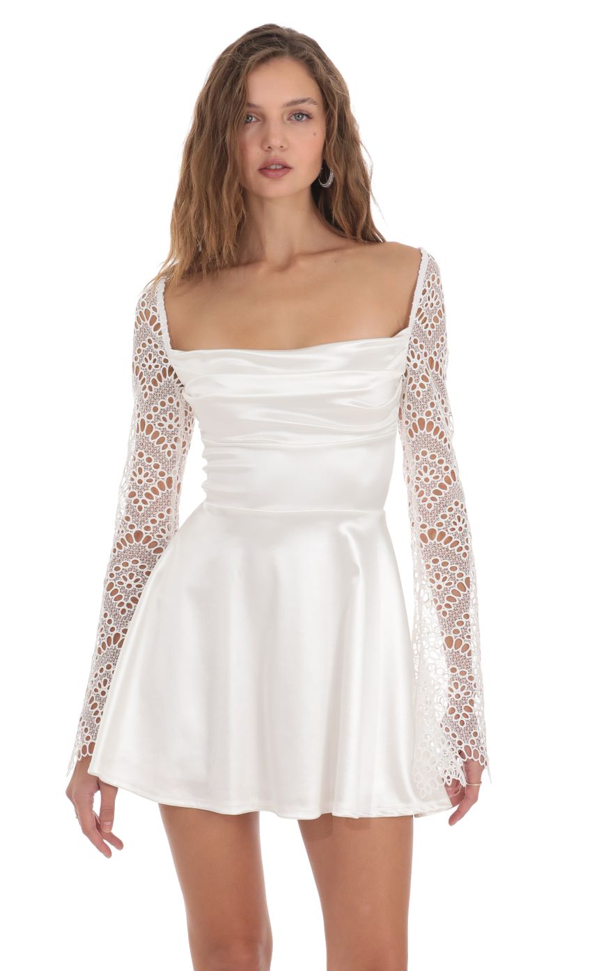Picture Satin Eyelet Sleeve Dress in White. Source: https://media-img.lucyinthesky.com/data/Nov23/850xAUTO/f3da6056-c54c-4ae0-86fa-831518c02cd0.jpg
