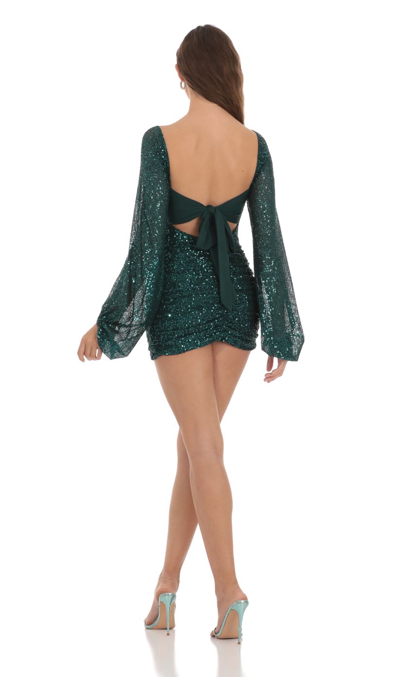 Picture Sequin Cutout Ruched Dress in Green. Source: https://media-img.lucyinthesky.com/data/Nov23/850xAUTO/f419a5f0-9cb3-4ece-8aa3-02b1ba60794f.jpg