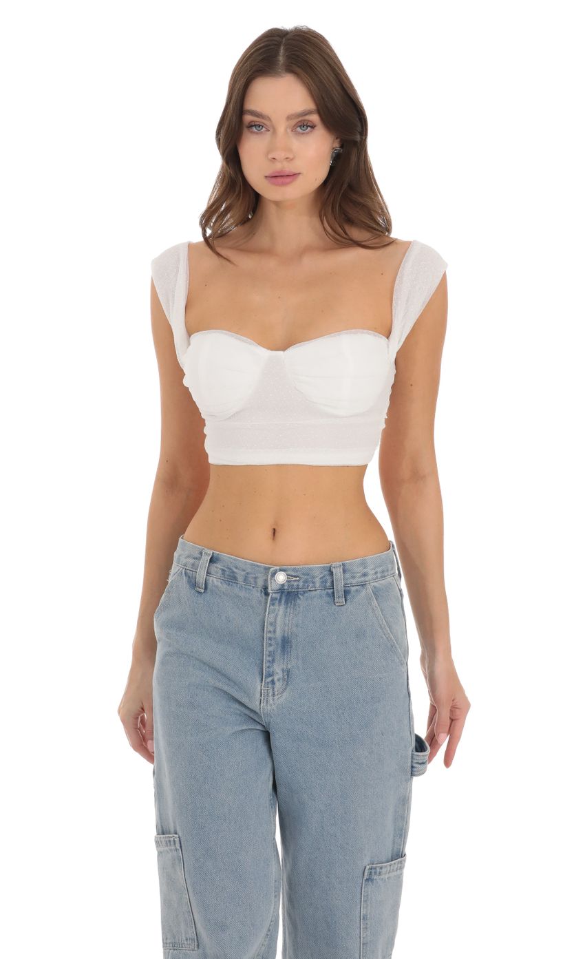 Picture Dotted Mesh Top in White. Source: https://media-img.lucyinthesky.com/data/Nov23/850xAUTO/ffc0d8dd-0484-43ba-8beb-f3f01118d3c2.jpg