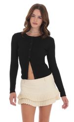 Picture Ribbed Knit Button Cardigan in Black. Source: https://media-img.lucyinthesky.com/data/Nov24/150xAUTO/5ac66a7b-f6c9-4474-8980-9488b033f596.jpg