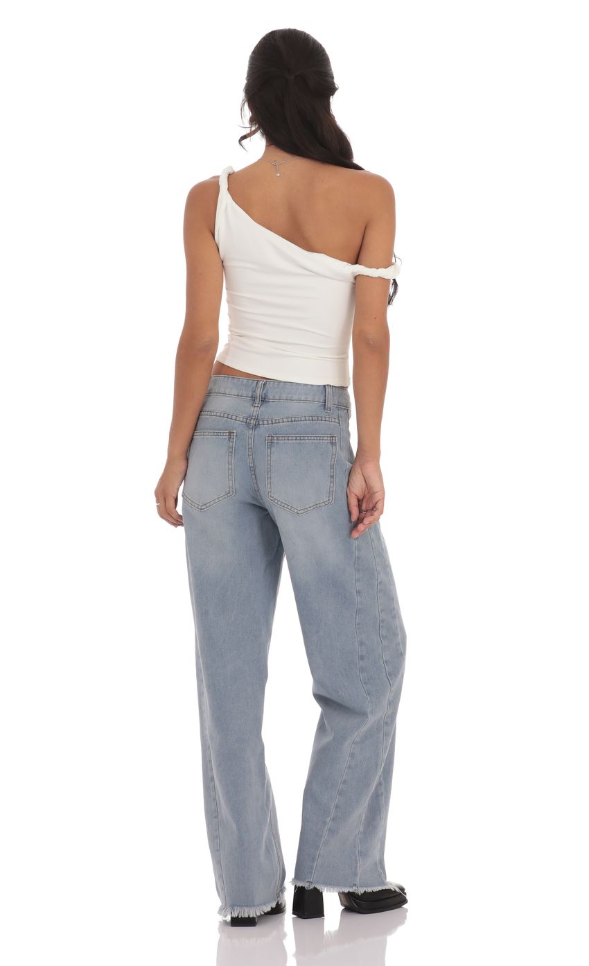 Picture Faded Cutoff Jeans in Denim. Source: https://media-img.lucyinthesky.com/data/Nov24/850xAUTO/a85c05ad-df97-4df6-985b-c5d1a874fc52.jpg