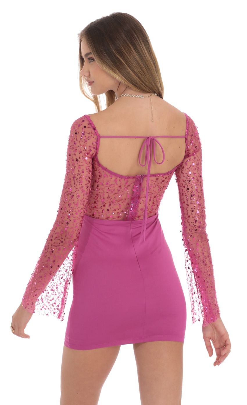 Picture Sequin Long Sleeve Dress in Magenta. Source: https://media-img.lucyinthesky.com/data/Nov24/850xAUTO/c650bf6b-0bf9-4cab-93d9-d8c43c2a4378.jpg