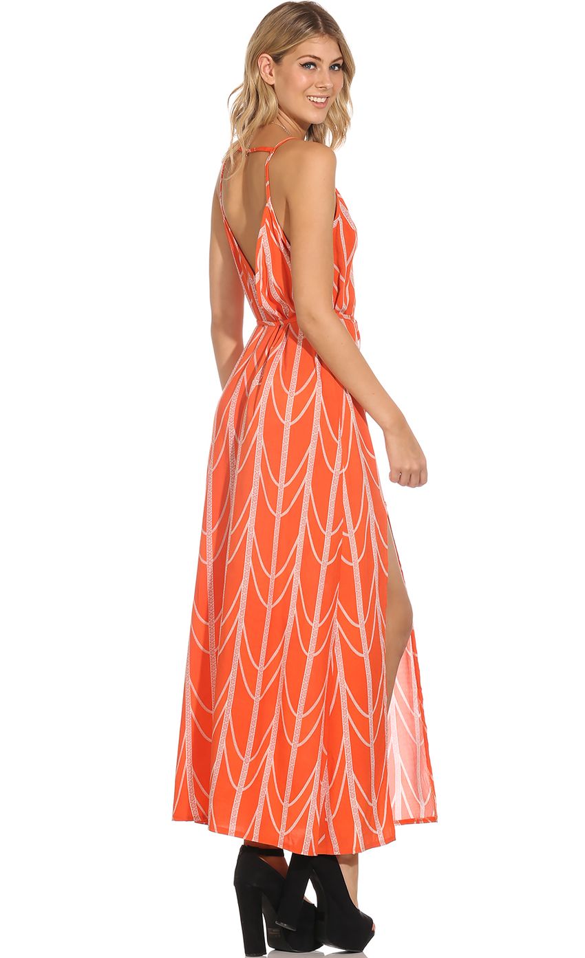 Picture MIDNIGHT HOUR DRESS IN ORANGE. Source: https://media-img.lucyinthesky.com/data/Oct14_2/850xAUTO/0Y5A9891.JPG