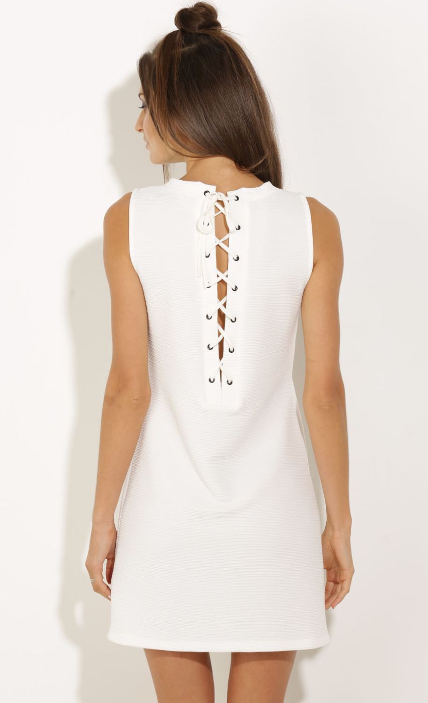 Picture Lace-Up Shift Dress In Ivory. Source: https://media-img.lucyinthesky.com/data/Oct15_1/850xAUTO/0Y5A7731.JPG