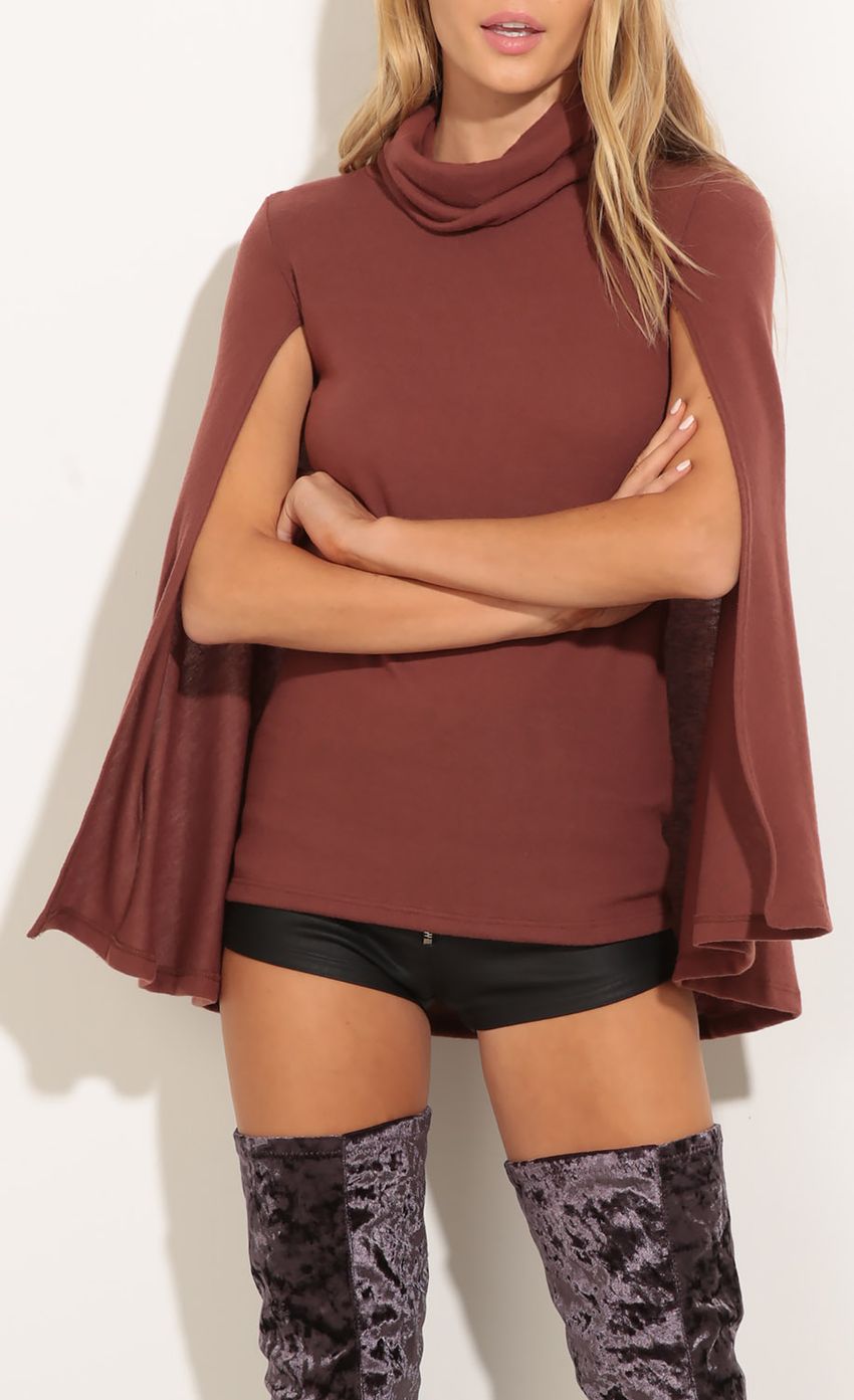Picture High Neck Knit Poncho Top. Source: https://media-img.lucyinthesky.com/data/Oct16_1/850xAUTO/0Y5A0590.JPG