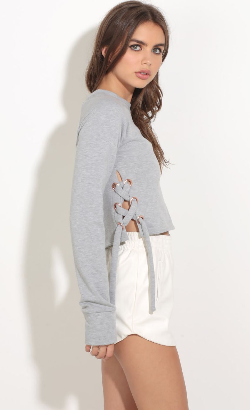 Picture Lace-Up Raglan Crop Jumper In Grey. Source: https://media-img.lucyinthesky.com/data/Oct16_2/850xAUTO/0Y5A1605.JPG