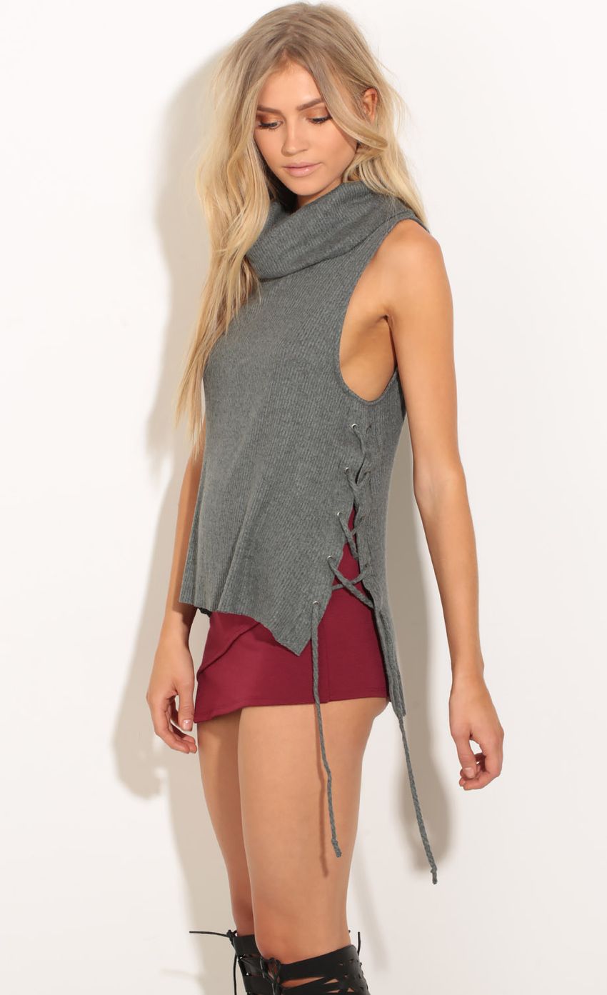 Picture Sleeveless Lace-Up Jumper In Grey. Source: https://media-img.lucyinthesky.com/data/Oct16_2/850xAUTO/0Y5A6124.JPG