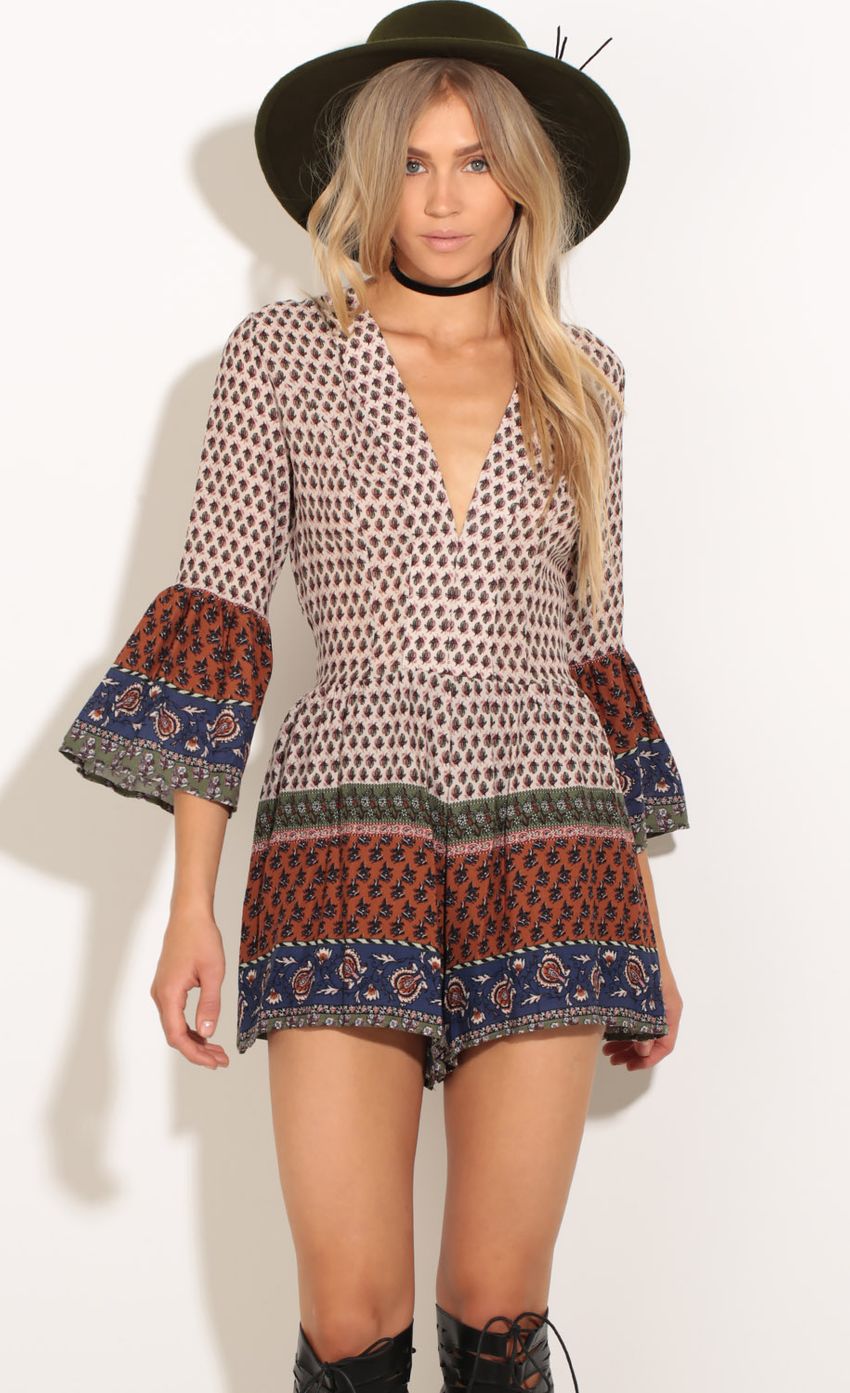 Picture Patterned Plunge Romper. Source: https://media-img.lucyinthesky.com/data/Oct16_2/850xAUTO/0Y5A7096.JPG