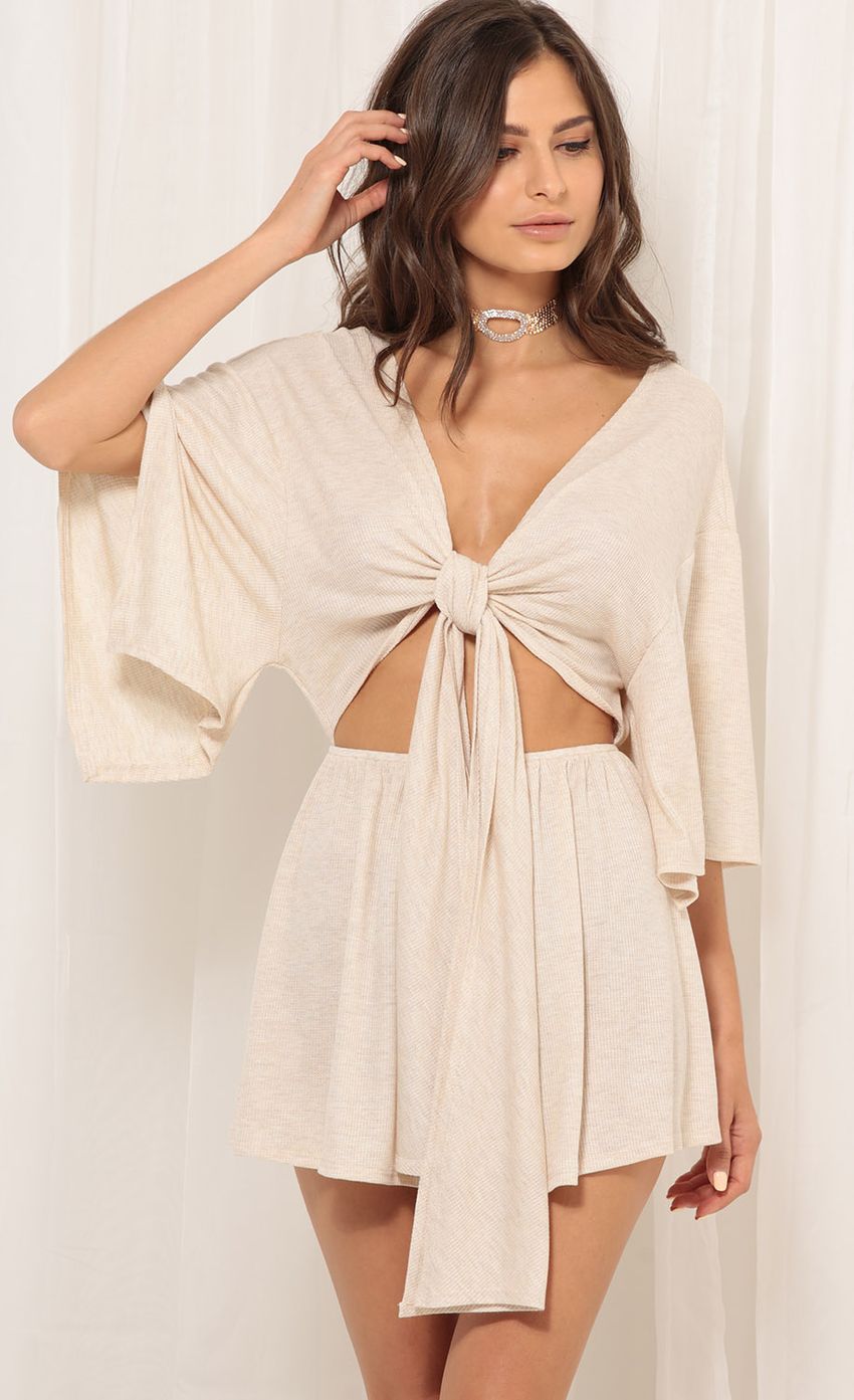 Picture Sunkiss Front Tie Romper In Beige. Source: https://media-img.lucyinthesky.com/data/Oct17_1/850xAUTO/0Y5A3122.JPG