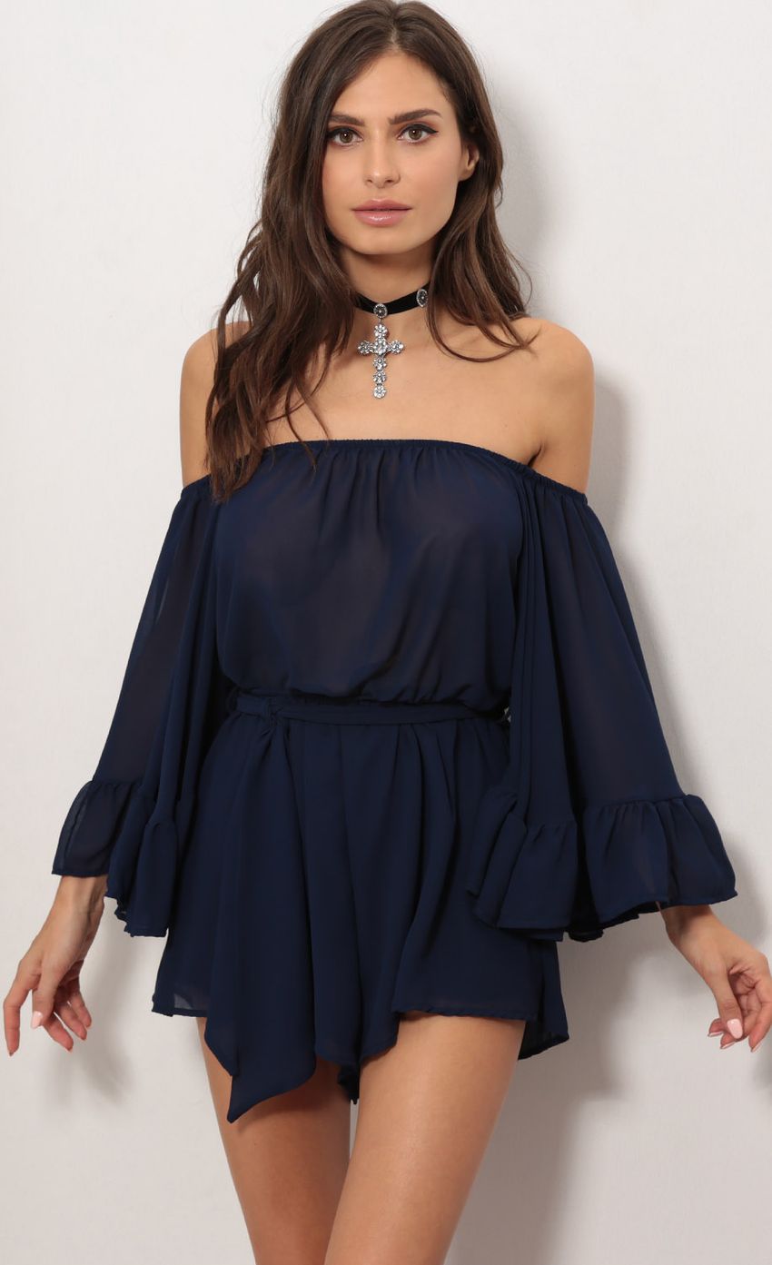 Picture Open Shoulder Romper in Navy. Source: https://media-img.lucyinthesky.com/data/Oct17_2/850xAUTO/0Y5A1498SS.JPG