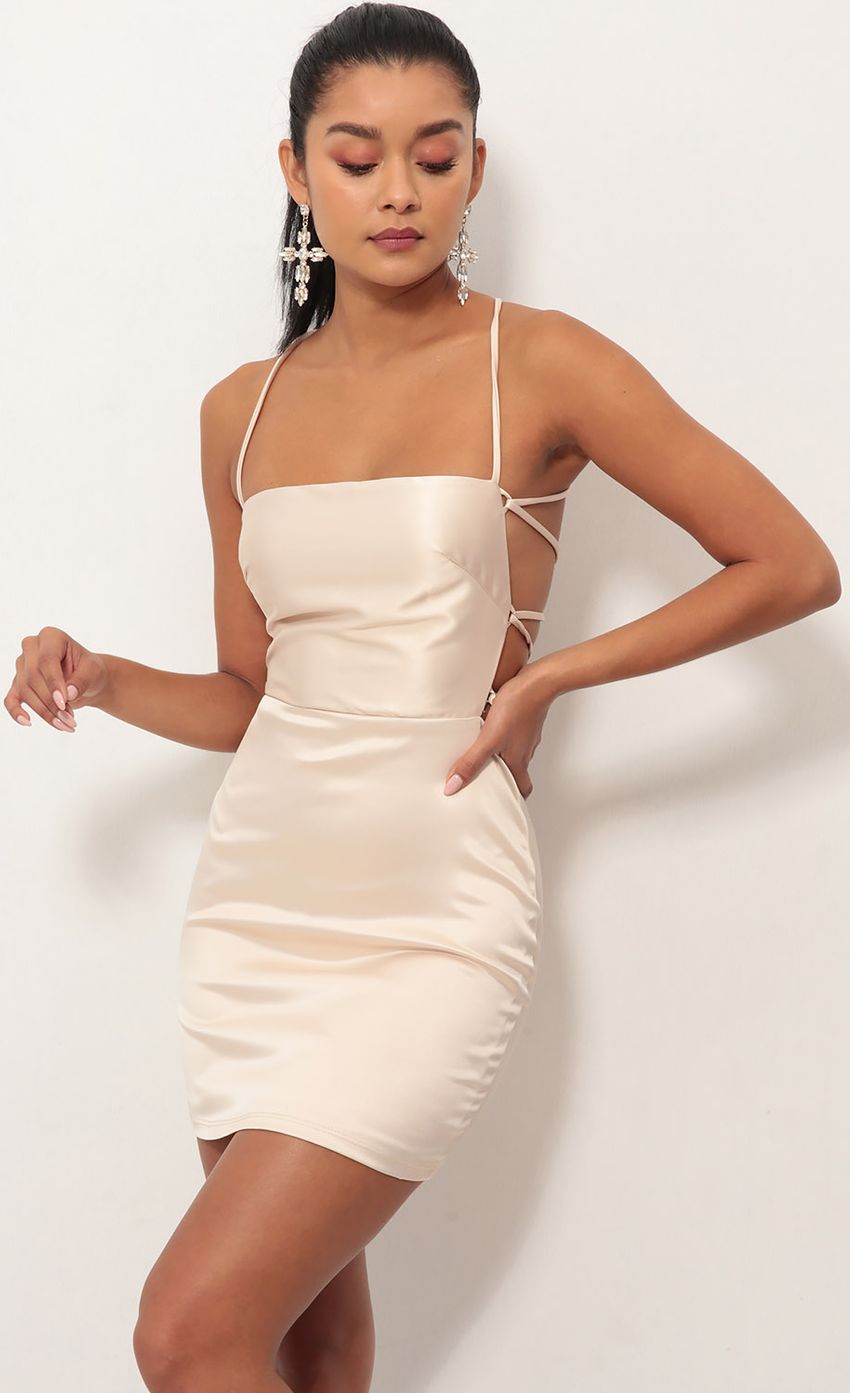 Picture Satin Lace-up Dress in Champagne. Source: https://media-img.lucyinthesky.com/data/Oct18_1/850xAUTO/0Y5A3091S.JPG