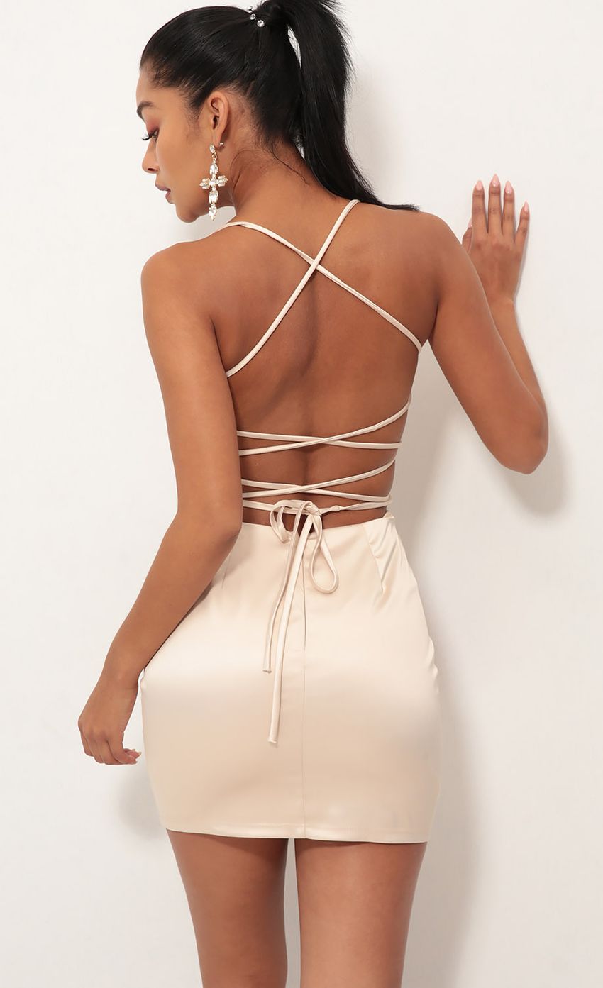 Picture Satin Lace-up Dress in Champagne. Source: https://media-img.lucyinthesky.com/data/Oct18_1/850xAUTO/0Y5A3119S.JPG