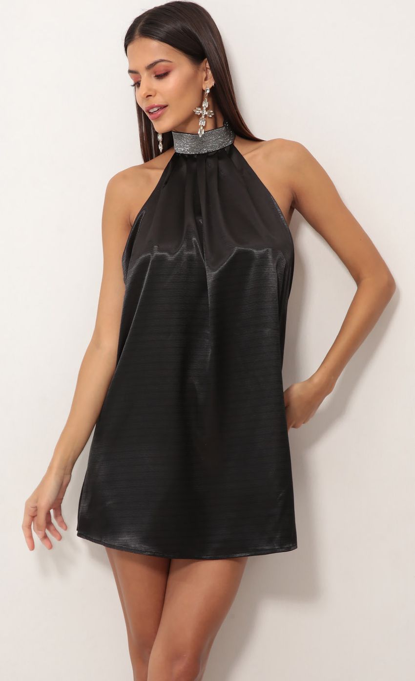 Picture Midnight Halter A-line Dress in Black. Source: https://media-img.lucyinthesky.com/data/Oct18_2/850xAUTO/0Y5A4276.JPG