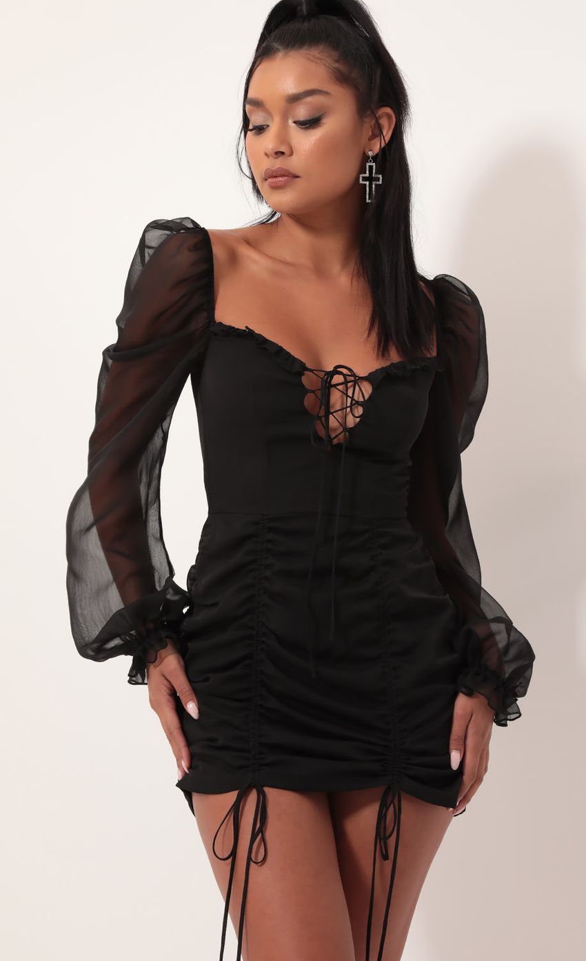 Picture Chiffon Puff Sleeve Dress in Black. Source: https://media-img.lucyinthesky.com/data/Oct19_1/850xAUTO/781A5784.JPG